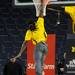 Michigan junior quarterback Denard Robinson attempts to dunk a football during a taping of ESPN's College Game Day at Crisler Arena on Saturday morning. Melanie Maxwell I AnnArbor.com